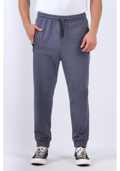 Erkek Dar Paça Regular Kalıp Pamuklu Ribanalı Füme Eşofman Altı modelleri