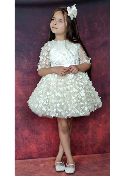 Kız Çocuk Kolları Şeffaf Tüllü ve Üzeri Papatya Motifli Beli Şerit Detaylı Krem Elbise