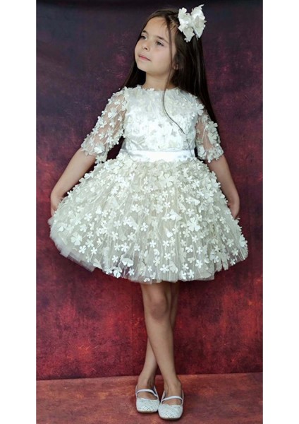 Kız Çocuk Kolları Şeffaf Tüllü ve Üzeri Papatya Motifli Beli Şerit Detaylı Krem Elbise fiyatları