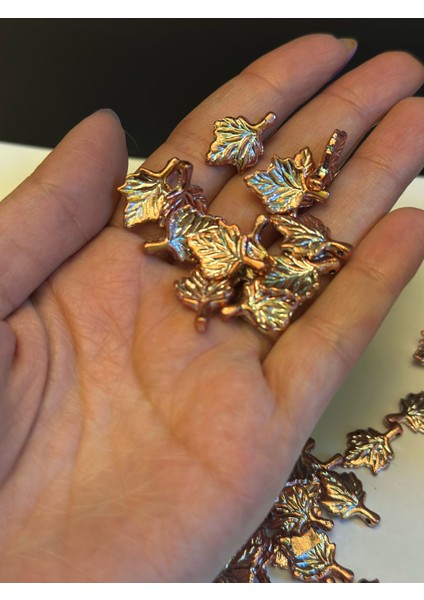 60 Adet Bakır Rengi Plastik Delikli Yaprak Boncuk 2x1 cm modelleri