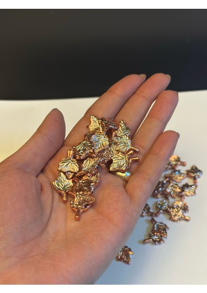 60 Adet Bakır Rengi Plastik Delikli Yaprak Boncuk 2x1 cm fırsatları