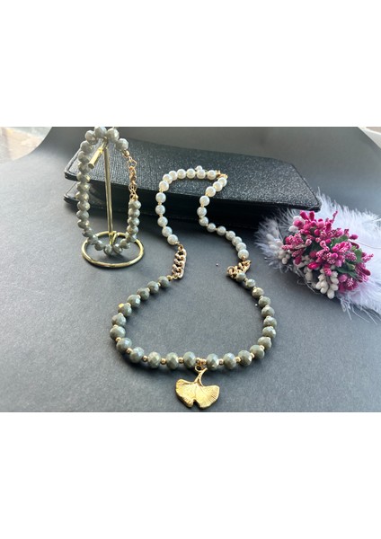 Kararmaz Altınkaplama Malzemeli Haki Kristal Boncuklu Incili Ginkgo Detaylı Kolye Bileklik Seti fiyatları