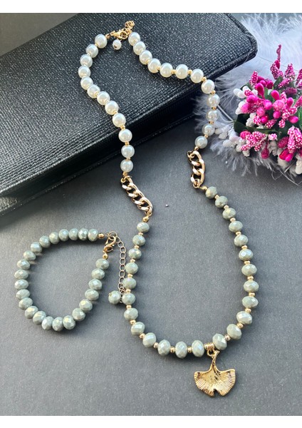 Kararmaz Altınkaplama Malzemeli Haki Kristal Boncuklu Incili Ginkgo Detaylı Kolye Bileklik Seti modelleri