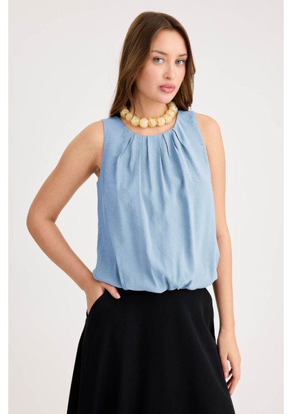 Önü Pileli Sıfır Kol Etek Ucu Lastikli Bluz