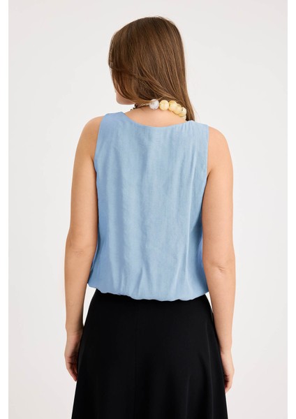 Önü Pileli Sıfır Kol Etek Ucu Lastikli Bluz fırsatları