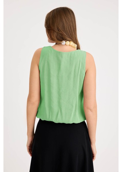 Önü Pileli Sıfır Kol Etek Ucu Lastikli Bluz indirimleri