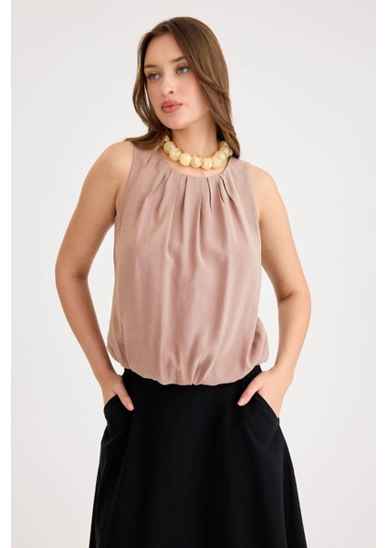 Önü Pileli Sıfır Kol Etek Ucu Lastikli Bluz modelleri