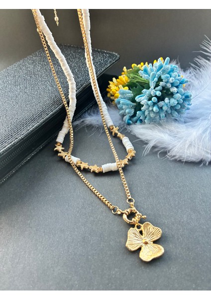 Beyaz Fimo Boncuklu Deniz Yıldızı ve Çiçek Detaylı Kararmaz Altın Kaplama Zincirli Ikili Kolye modelleri