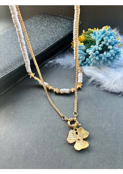 Beyaz Fimo Boncuklu Deniz Yıldızı ve Çiçek Detaylı Kararmaz Altın Kaplama Zincirli Ikili Kolye fırsatları