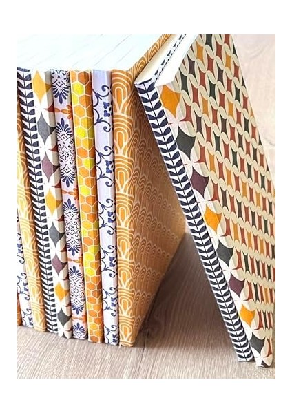 Tanıtım Amerikan Ciltli, A5 Kareli Defter, 64 Yaprak, 90 Gr. Ivory Kağıt, 6 Farklı Kapak Tasarımı (Desen I Kapak Tasarım)
