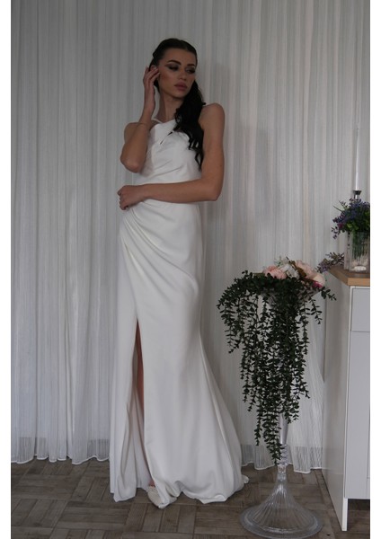 Beyaz Kadın Kruvaze Yaka Yırtmaç Detaylı Uzun Abiye Elbise 1105273.15 fiyatları