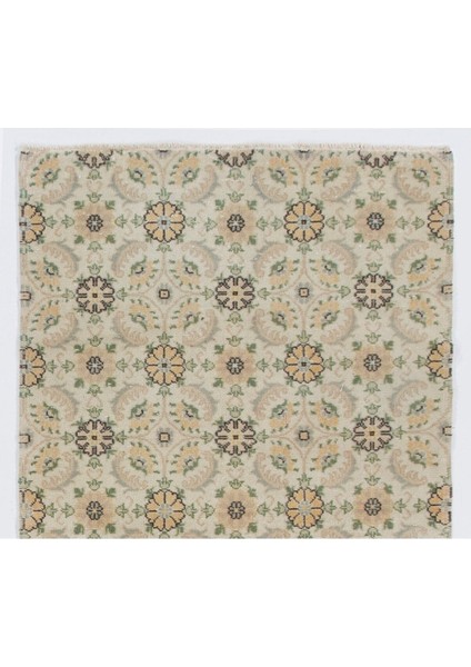 119 x 212 cm Soluk Tonlardaeski Çiçek Tasarımlı Orta Anadolu Halısı. Bej El Yapımı Halı