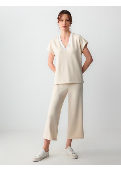 Açık Bej Rahat Kesım Yüksek Bel Bol Paça Kısa Örme Pantolon