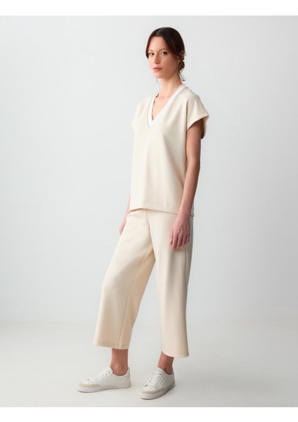 Açık Bej Rahat Kesım Yüksek Bel Bol Paça Kısa Örme Pantolon fiyatları