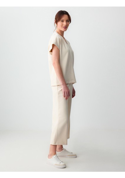 Açık Bej Rahat Kesım Yüksek Bel Bol Paça Kısa Örme Pantolon modelleri