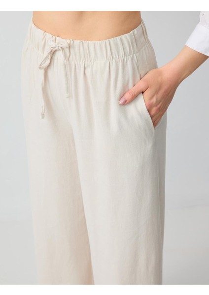 Taş Rahat Kesim Yüksek Bel Bol Paça Uzun Keten Pantolon indirimleri