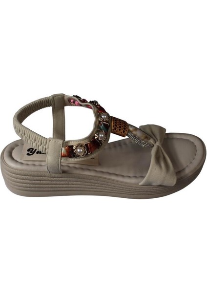 Yazkış Kadın Siyah Ten Cilt Tek Bantlı Üzeri ve Bileği Taşlı 4cm Arkası Lastikli Kalın Taban Sandale fiyatları