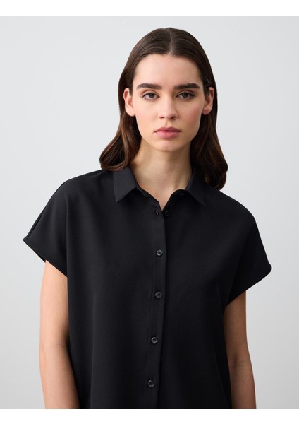 Siyah Düz Kesim Kolsuz Dokuma Gömlek indirimleri