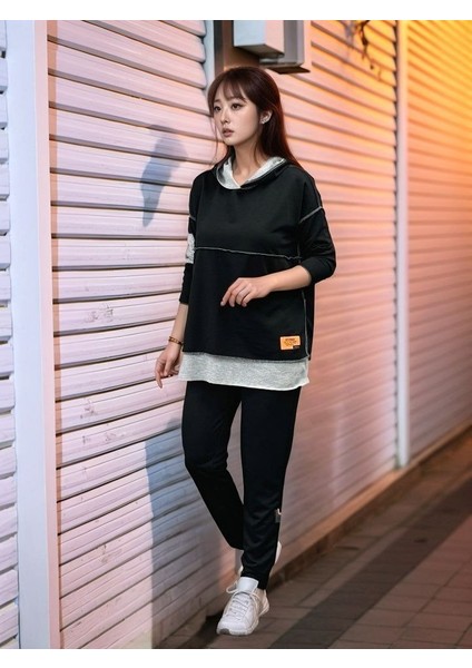 Kadın Siyah Kapşonlu Etek Ucu Detay Arma Ters Dikiş Gorunumlu Ikili Takım modelleri