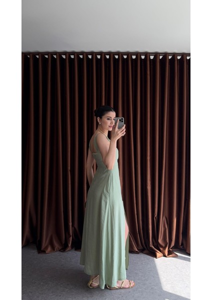 Yırtmaçlı Çağla Yeşili Uzun Elbise fiyatları
