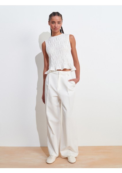 50845 Kolsuz Crop Bluz-Ekru indirimleri