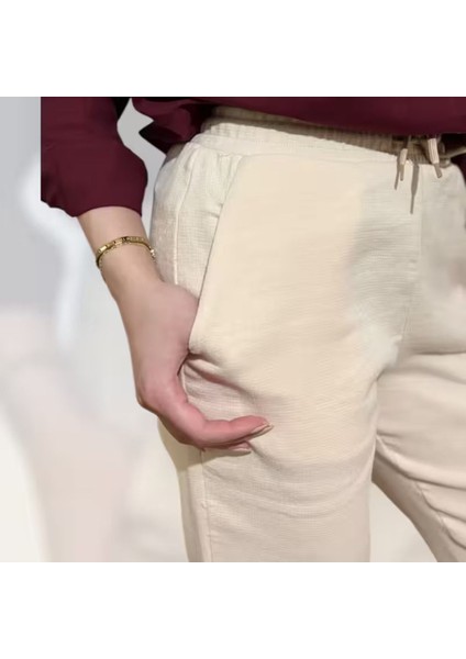 Beli ve Paçası Lastikli Kadın Keten Pantolon - Modern ve Rahat fiyatları
