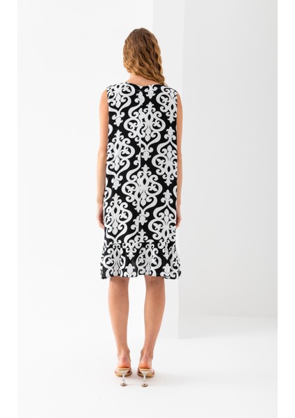 Kadın Siyah Beyaz Eteği Fırfırlı Kolsuz V Yaka Viskon Dokuma Elbise modelleri