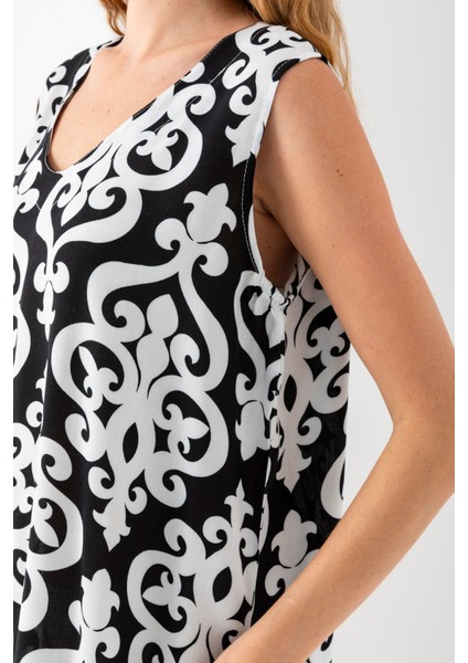 Kadın Siyah Beyaz Eteği Fırfırlı Kolsuz V Yaka Viskon Dokuma Elbise indirimleri