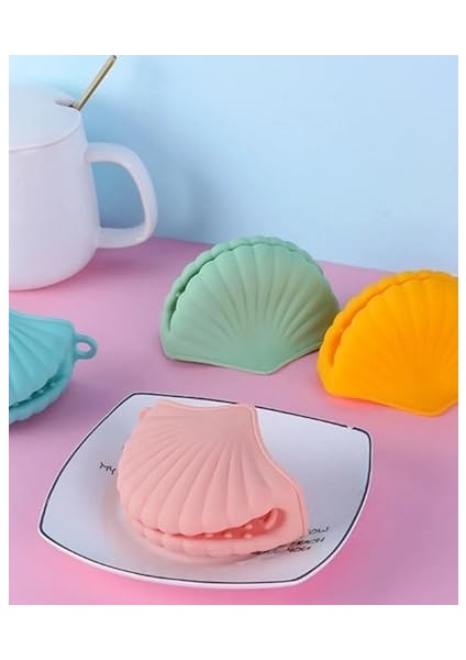 Menashop Silikon Tepsi ve Tencere Tutucu, Isıya Dayanıklı ve Kaymaz Tasarım, Çok Amaçlı Kullanım, Esnek ve Dayanıklı Malzeme, Mutfak Için Pratik ve Güvenli Çözüm (Istiridye) modelleri