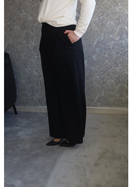 Bol Paça Pileli Pantolon fiyatları