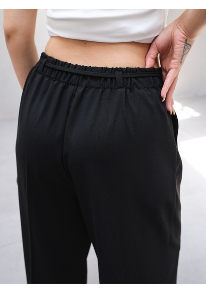 Beli̇ Lasti̇k ve Bağcikli Geni̇ş Paça Pantolon