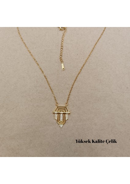 Parlak Taş Detaylı Gold Renk Çelik Serenay Kolye fiyatları