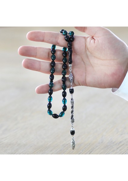 Kararmaz Metal Halat Püsküllü Arpa Kesim Turkuaz-Siyah Ateş Kehribar Tesbih fiyatları