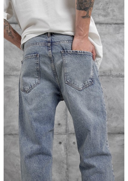 Mavi Yırtık Detaylı Baggy Jean indirimleri