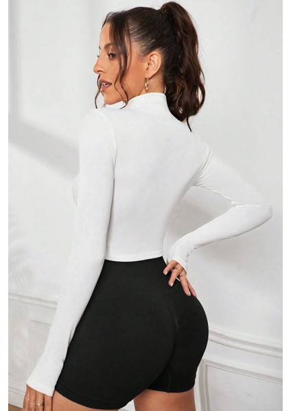Kadın Beyaz Uzun Kol Fermuarlı Parmak Geçme Detaylı Dik Yaka Crop Top Bluz fiyatları