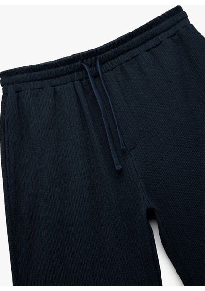 Cep Detaylı Dokulu Beli Bağcıklı Şort modelleri