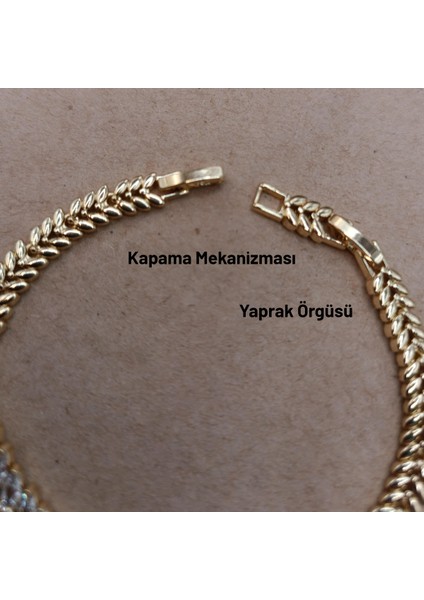 Göz Alıcı Yaprak Tasarımlı Zirkon Taşlı Altın Rengi Bileklik modelleri