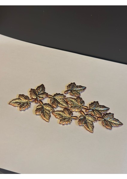 12 Adet Bakır Rengi Plastik Yaprak Delikli Boncuk 5x3 cm fiyatları