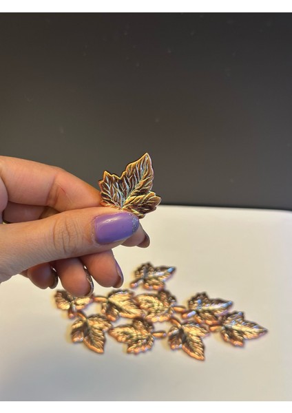 12 Adet Bakır Rengi Plastik Yaprak Delikli Boncuk 5x3 cm modelleri