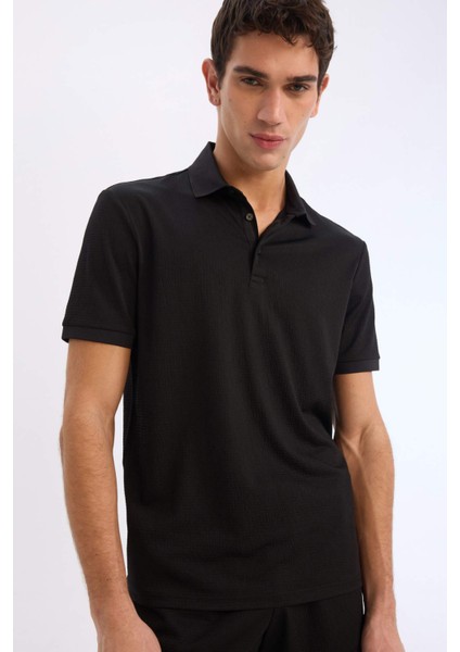 Slim Fit Dar Kesim Polo Yaka Dokulu Kısa Kollu Krinkıl Siyah Tişört E1222AX25SM