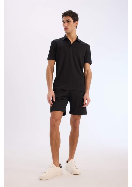 Slim Fit Dar Kesim Polo Yaka Dokulu Kısa Kollu Krinkıl Siyah Tişört E1222AX25SM fiyatları