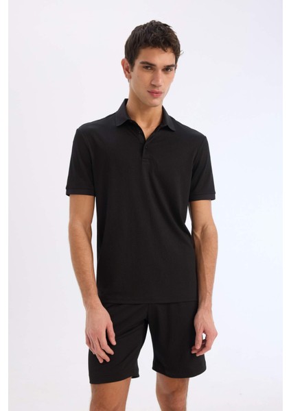 Slim Fit Dar Kesim Polo Yaka Dokulu Kısa Kollu Krinkıl Siyah Tişört E1222AX25SM modelleri