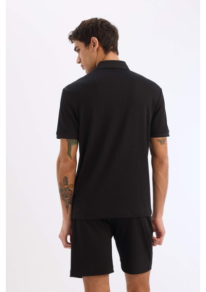 Slim Fit Dar Kesim Polo Yaka Dokulu Kısa Kollu Krinkıl Siyah Tişört E1222AX25SM indirimleri