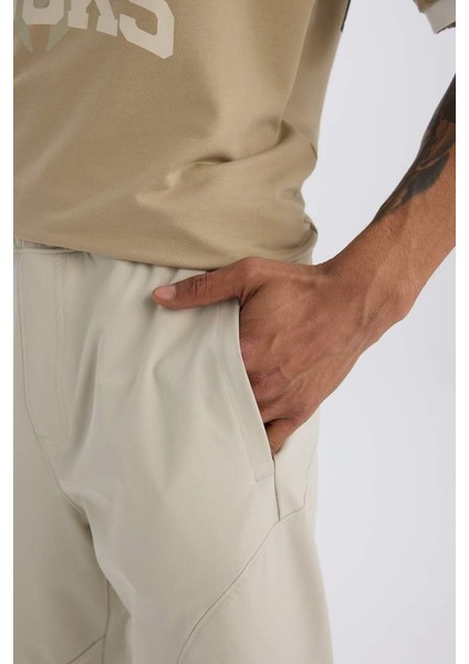 Yeni Sezon Defactofit Sporcu Jogger Eşofman Altı Slim Fit Dar Kesim Dokuma Üç Cepli Fermuarlı Paça fırsatları