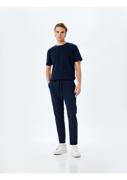 Yeni Sezon Slim Fit Cep Detaylı Viskon Karışımlı Beli Bağcıklı Pantolon