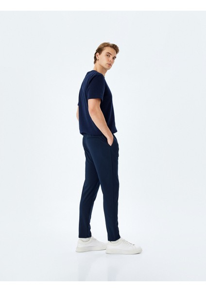 Yeni Sezon Slim Fit Cep Detaylı Viskon Karışımlı Beli Bağcıklı Pantolon fiyatları