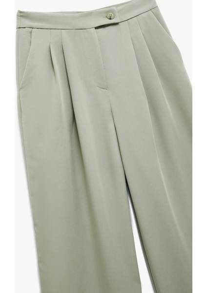 Rahat Kesim Cepli Pile Detaylı Modal Kumaş Karışımlı Palazzo Pantolon modelleri