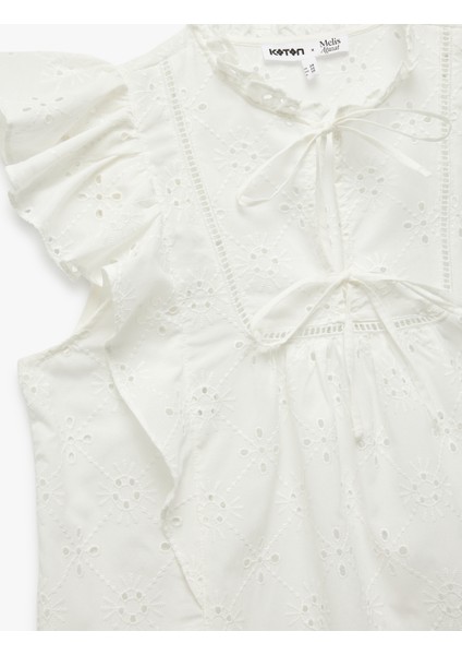 x Melis Ağazat - Kolsuz Brodeli Fiyonk Detaylı Fisto Fırfırlı Bluz modelleri