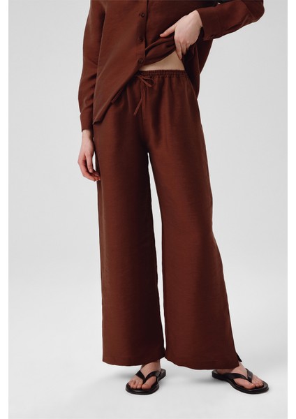 Kahverengi Paçası Yırtmaçlı Kadın Pantolon fiyatları