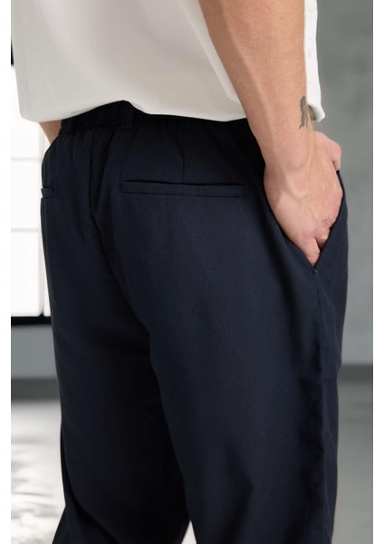 Önü Çift Pileli Fermuarlı Beli Lastikli Jogger Erkek Pantolon - Lacivert fiyatları